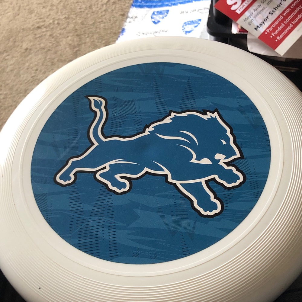 Blue and White Frisbee with Lion Logo